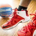 Close up of sports shoes on floor